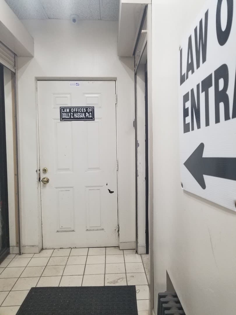 The law offices entrance inside the building, signposted from the street